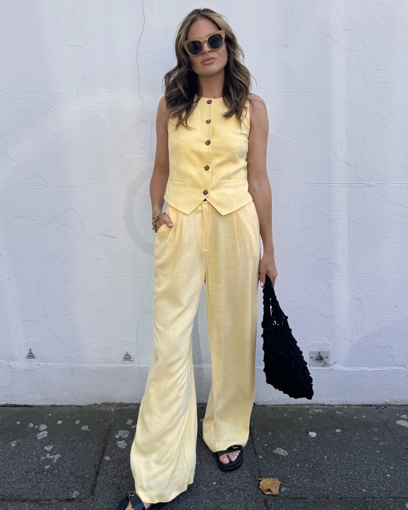 Yellow waistcoat | Yellow relaxed tailored trousers | Black macrame bag | Black chunky sandals | Chunky sunglasses 

Summer outfit | Nobody’s Child 

#LTKeurope #LTKsummer #LTKuk