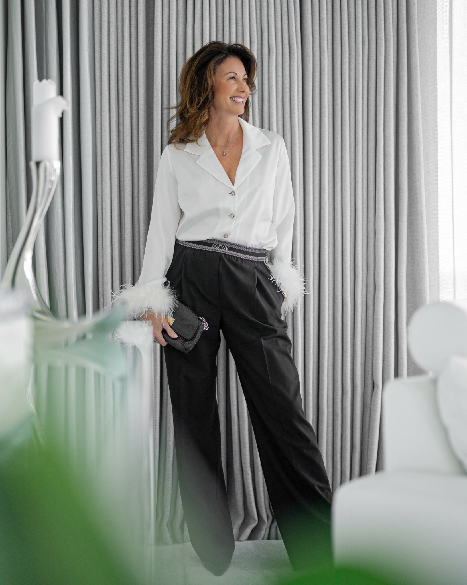 White blouse with feathers and black pants🪶

#LTKeurope #LTKpartywear #LTKfestive