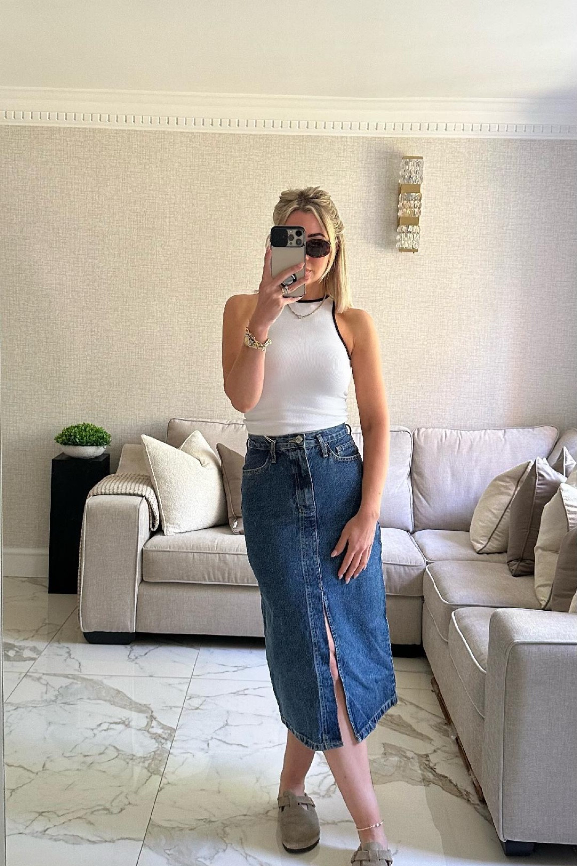 White tank top, black sunglasses, denim blue skirt, slit skirt, birkenstock sandal shoes, summer outfit, ootd 

#LTKstyletip #LTKeurope #LTKSeasonal