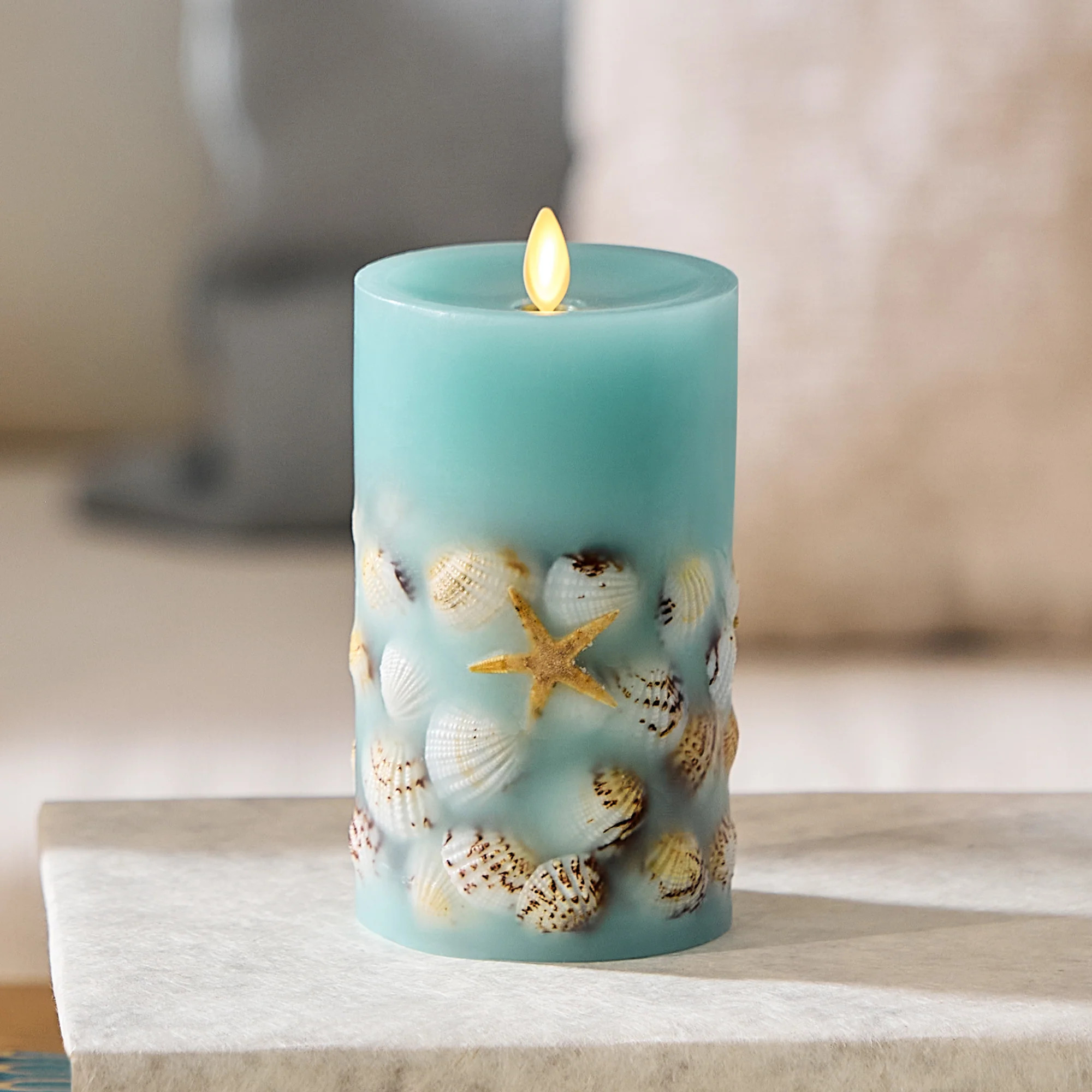 Soft Teal Embedded Seashell & Starfish Flameless Candle Pillar | Luminara