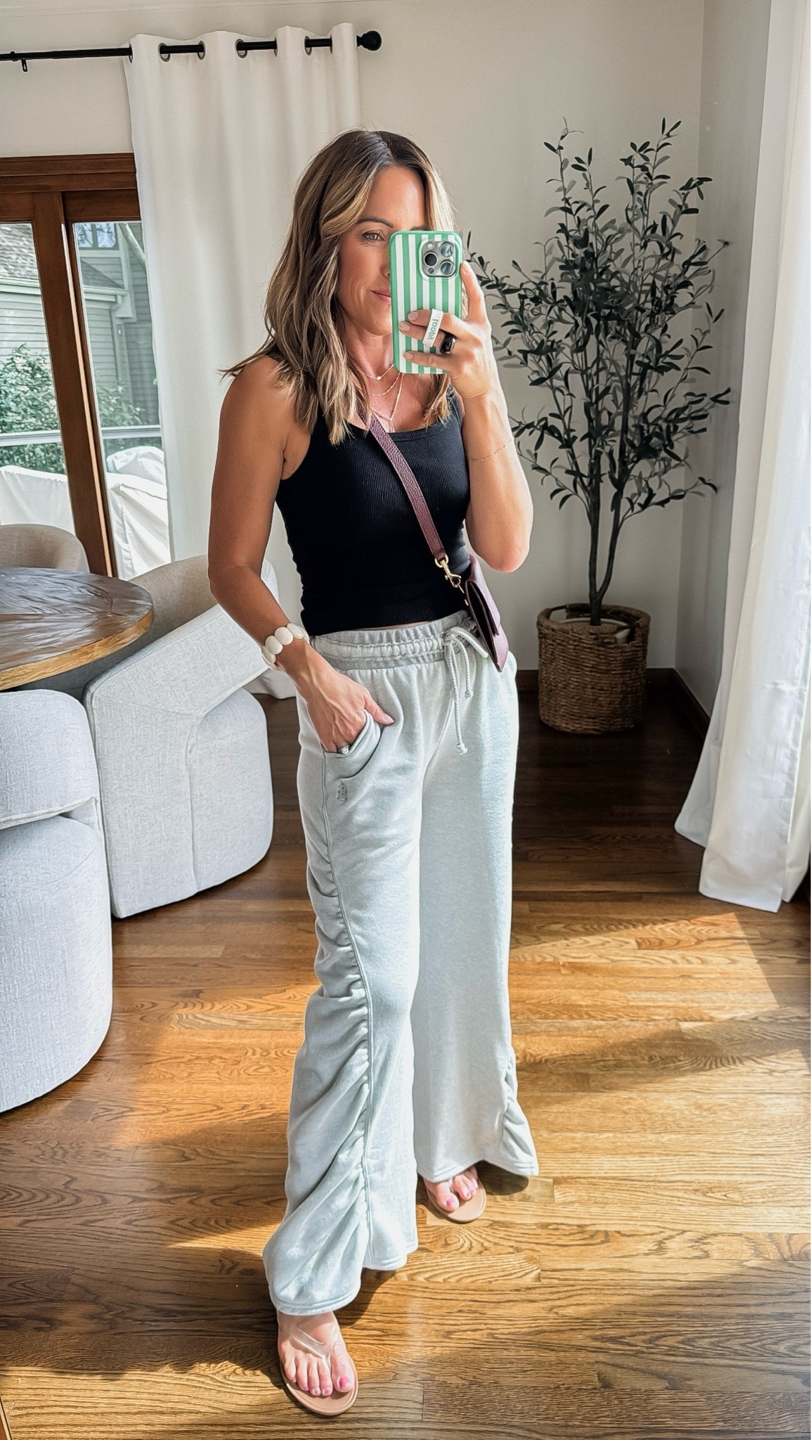 Cute weekend style. 
Athleisure. 
How pretty are the gathered details. 
XS pants 
XS tank

#LTKootd #LTKmomlife #LTKOver40