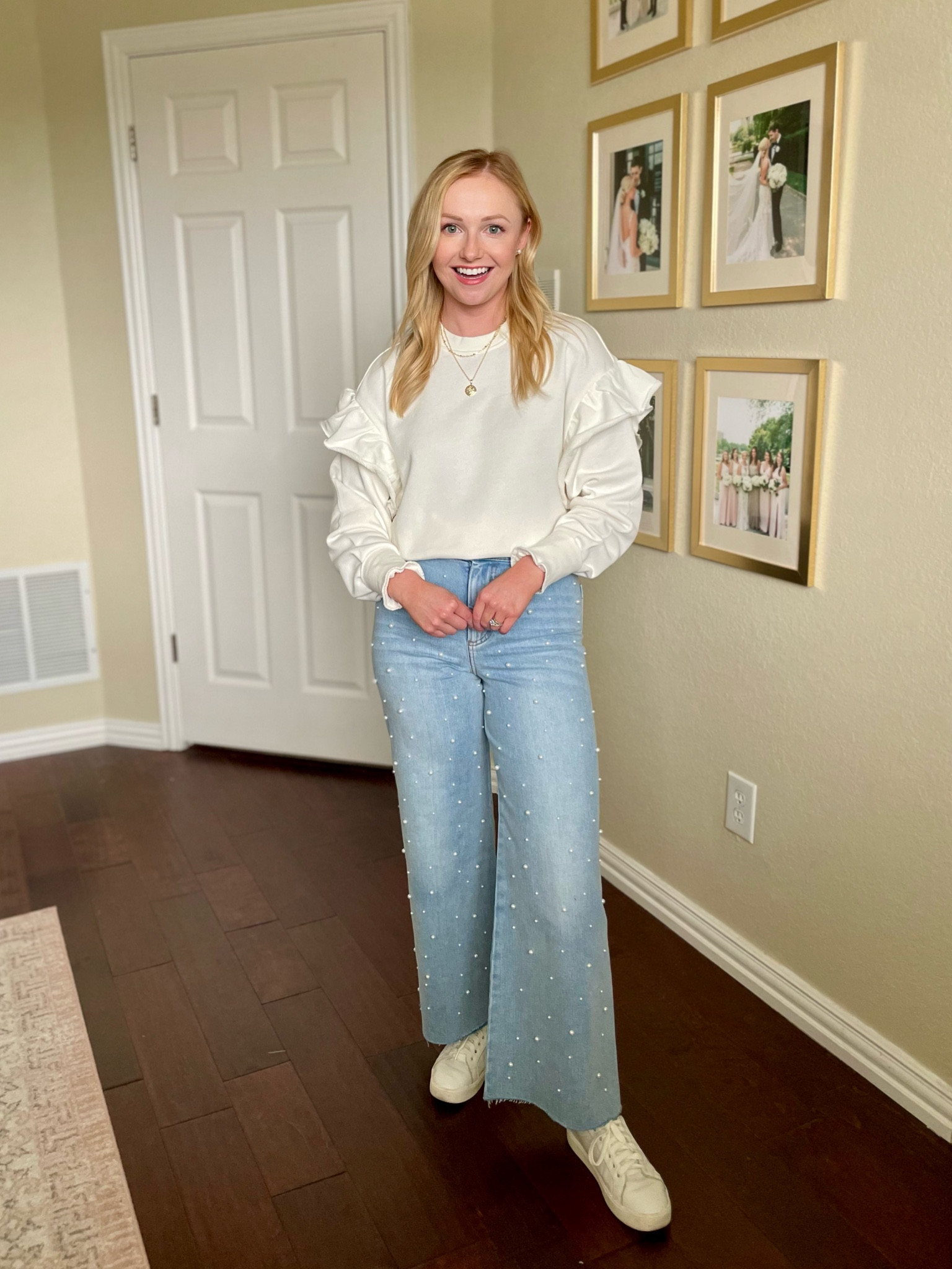 White ruffle sweatshirt, wearing an XS | sweatshirt, sweatshirt outfit, white sweatshirt, pearl jeans, wide leg jeans, white sneakers, spring outfit, casual spring outfit 

#LTKSeasonal #LTKfindsunder50 #LTKstyletip
