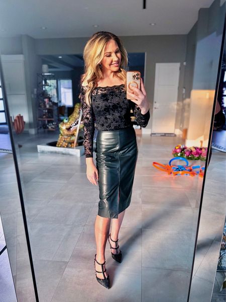 All black look — lace bodysuit, faux leather skirt, Valentino heels (with crystal rhinestones) and used my brand new curling iron for the voluminous curls on my hair!



#LTKbeauty #LTKstyletip #LTKfindsunder100