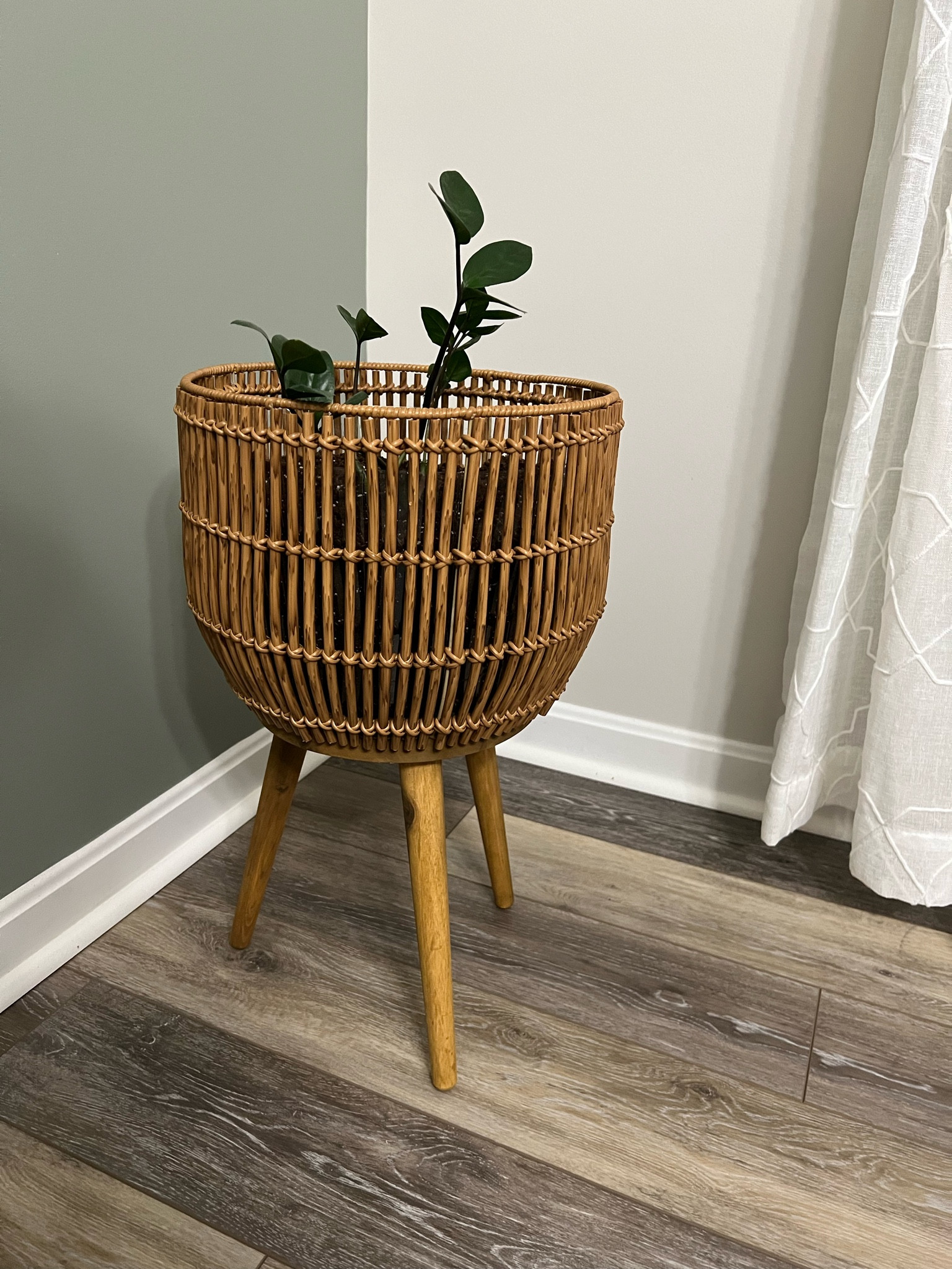 How cute is this resin planter with  stained wood legs 😍 

#LTKFind #LTKSeasonal #LTKhome