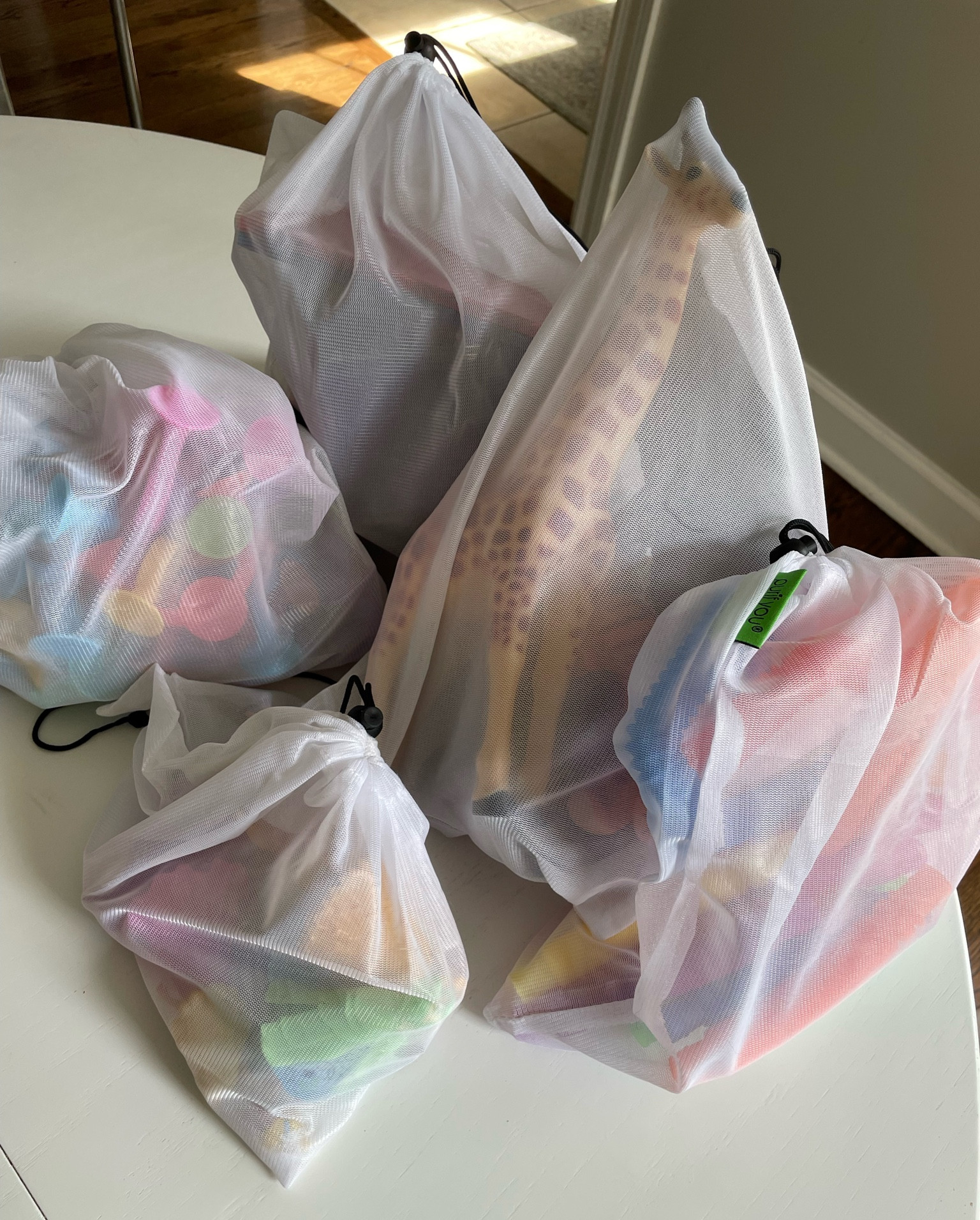 The best way to store your kid’s toys for travel are these reusable produce bags. They come in all different sizes and have a drawstring to help keep everything contained. Bonus perk is that they require my 1.5 year old toddler to have to ask for help opening the bags for what he wants instead of dumping all of the bags out immediately.  Mom win. 

#LTKfamily #LTKtravel #LTKkids