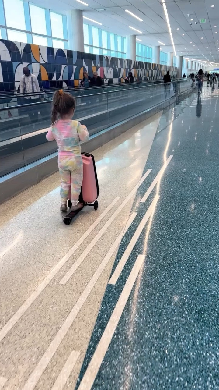 My favorite airport hack for parents!! 

The luggage scooter for the win! It folds down to go through security and fits in an overhead bin. 

Plus the luggage comes off to turn into a regular scooter at your destination! 

#LTKfamily #LTKtravel #LTKkids