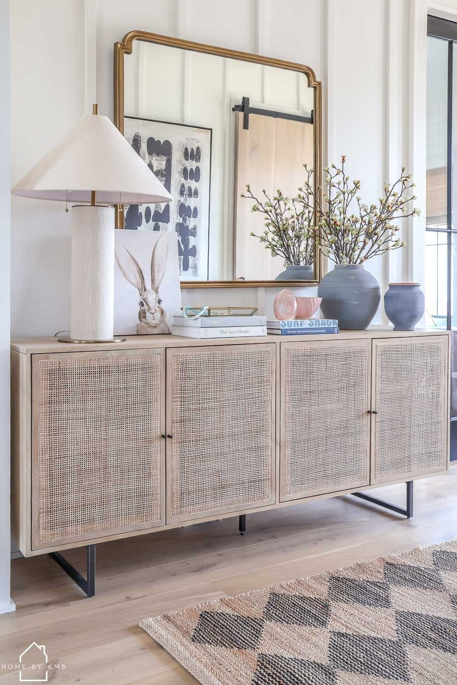 Spring styling, but make it intentional 🌿 Mixing structure (clean lines, symmetry) with movement (florals, natural elements) to create a space that feels both curated and alive. #entryway #consoletabledecor #springhomedecor

#LTKHome #LTKSeasonal