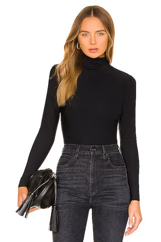 Hayden Turtleneck Top in True Black | Revolve Clothing (Global)