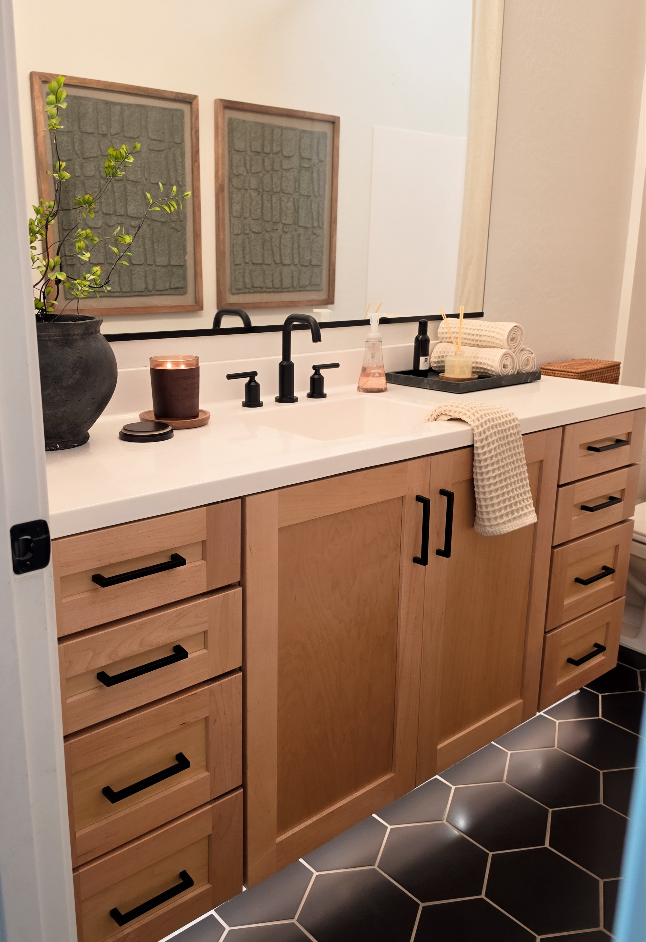 Proof that a boys' bathroom can be functional, masculine, and still feel guest-ready. A few simple styling touches made all the difference. 🖤#bathroom #boysbathroom #homedecor 

#LTKHome #LTKSeasonal