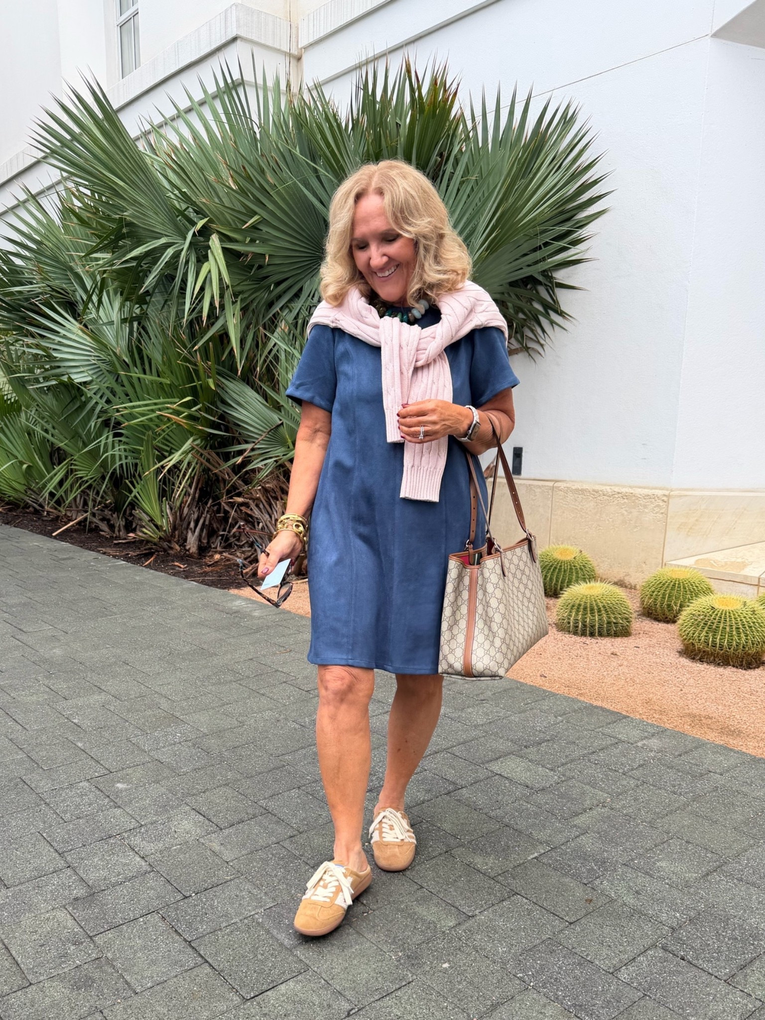 This dress is a steal! Faux suede trapeze dress wearing an 8 . I’m throwing on the cotton cable knit sweater over my shoulders because the air conditioning is freezing! Dinner at the hotel Emma tonight.

#LTKOver40 #LTKPetite #LTKootd