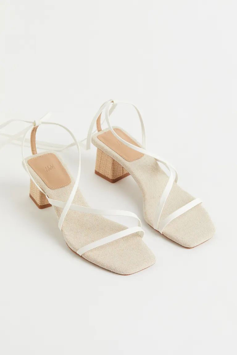 Sandals with narrow, faux leather straps crossed over foot and extending to tie around ankle. Can... | H&M (US + CA)