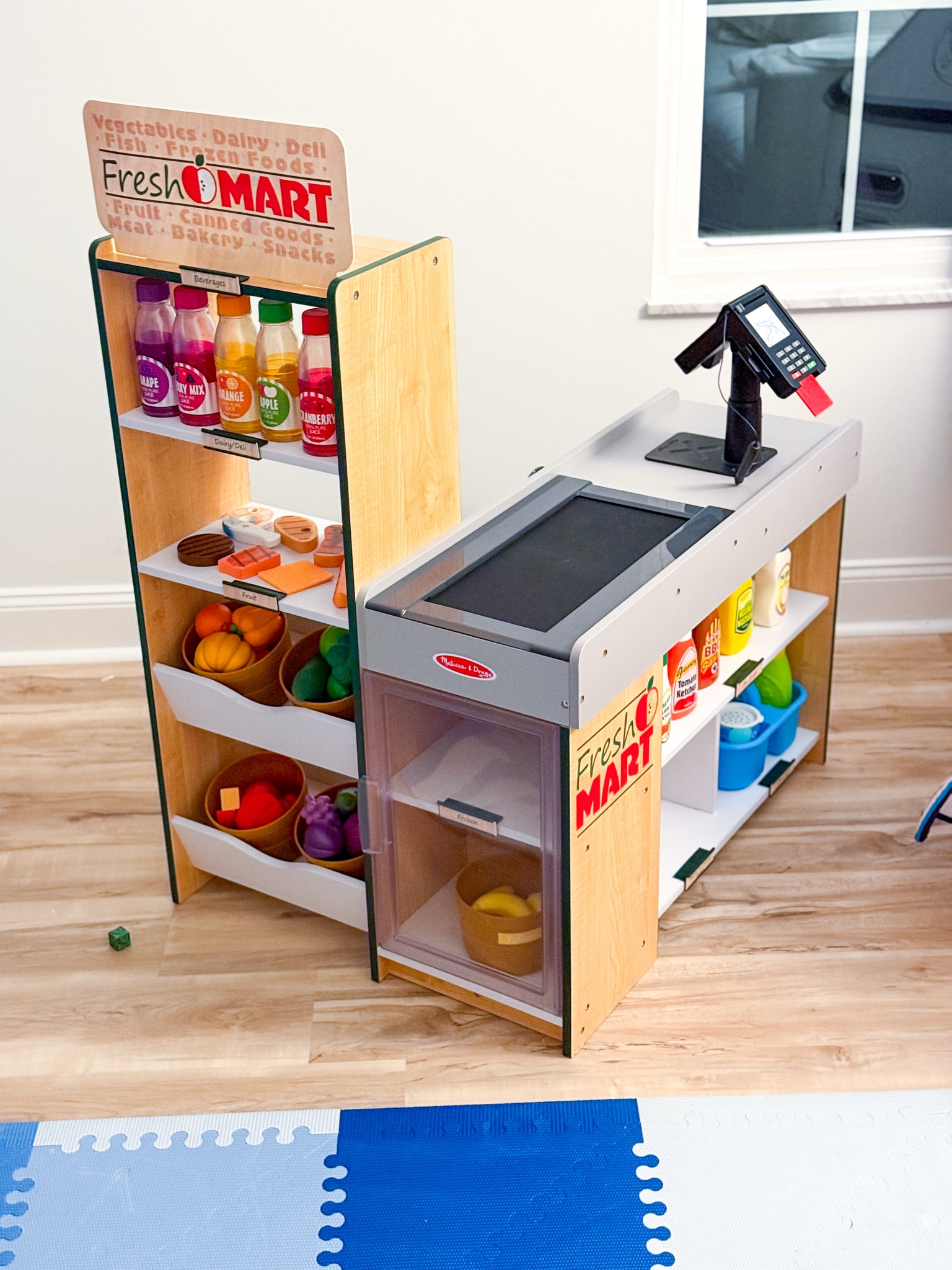 Pretend play grocery store with working conveyor belt, pay machine, and TONS of room for groceries. Melissa and Doug makes the BEST kids toys.  

#LTKKids
