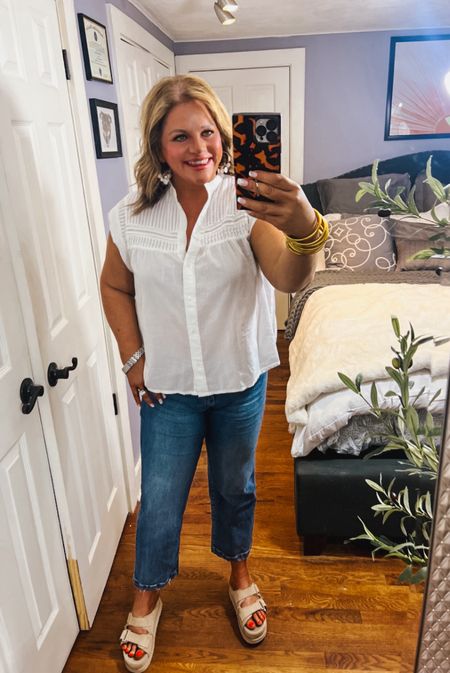 Sometimes, basic is best.
A nice, crisp white short and a pair of jeans! When buying button down shirts, I almost always need to size up. I have broad shoulders and D-cups. This linen top is so oversized that I stayed with my typical medium.
Also, these UGG sandals are the most comfortable shoes that I have EVER worn. They feel like you are standing on a cloud.
Jeans, sandals, button down, casual outfit, spring outfit, Target

#LTKxTarget #LTKSeasonal #LTKfindsunder50