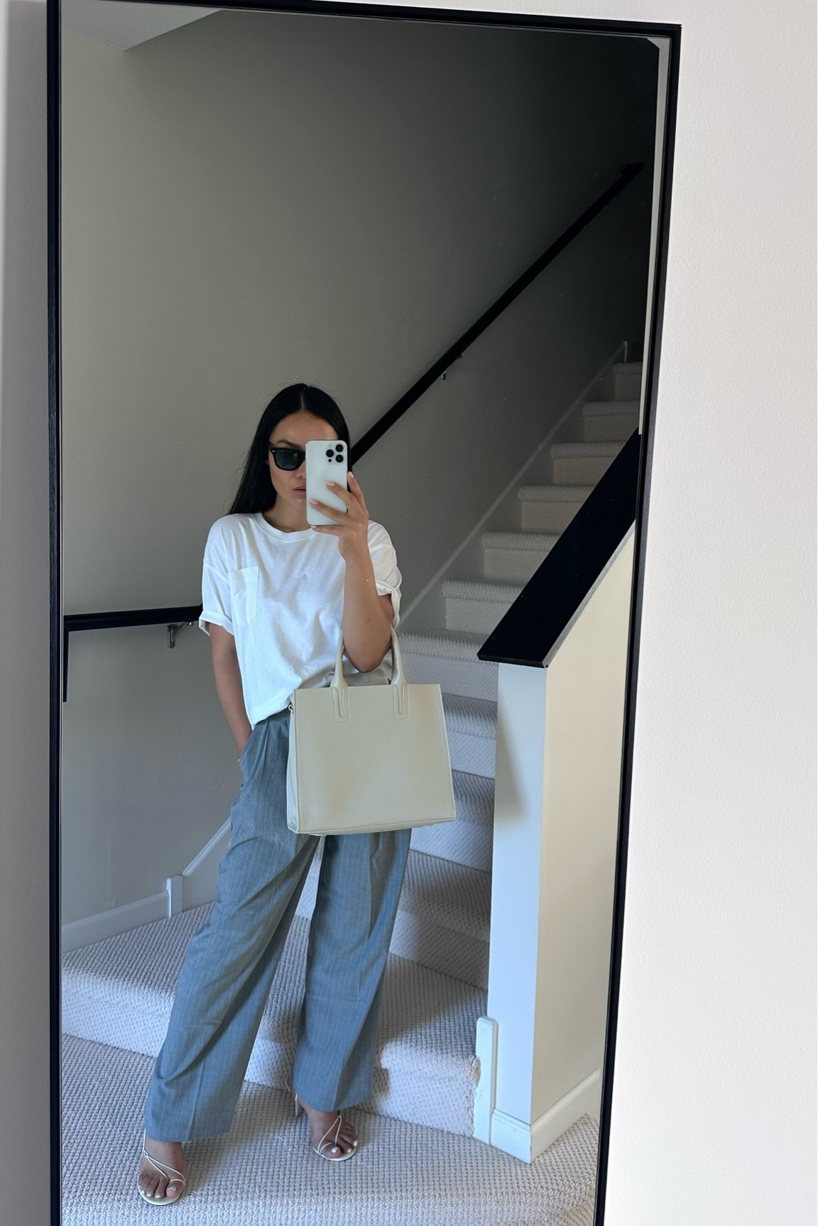 Outfit breakdown:
Trousers: The Frankie Shop Sybil Trousers Grey Pinstripe - I am wearing size small.
Shirt: Sandro Cropped White Tee - wearing size 1
Bag: Modaendrizzi Bianca Cream Pebbled Calf Special Edition 

#LTKitbag #LTKstyletip #LTKxNSale