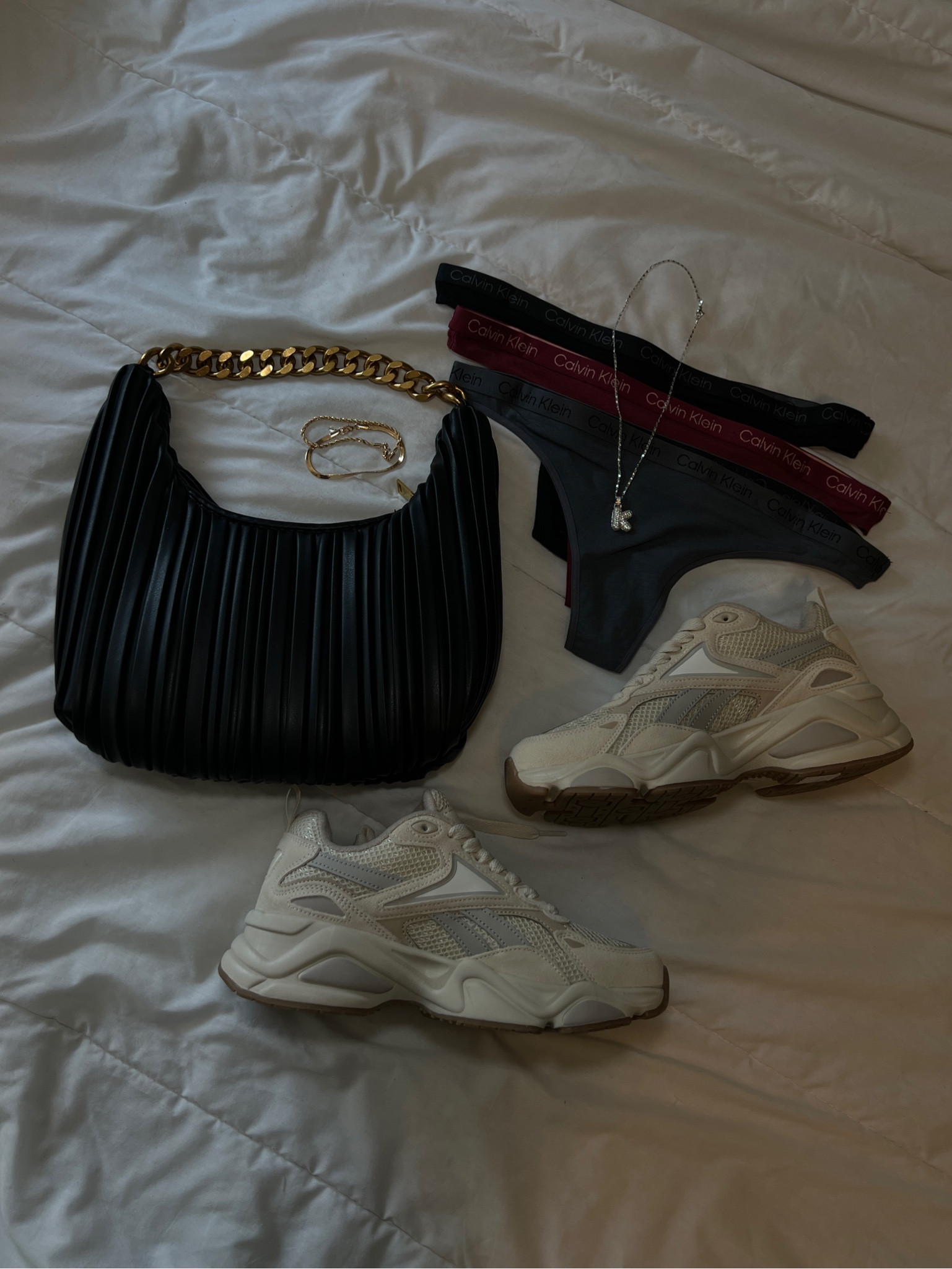 tj maxx finds, i found comparable items for you on amazon 🖤

black purse with gold chain, calvin klein thongs, silver bubble necklace, neutral reeboks, gold bracelets, 444, angel number 

#LTKShoeCrush #LTKBacktoSchool