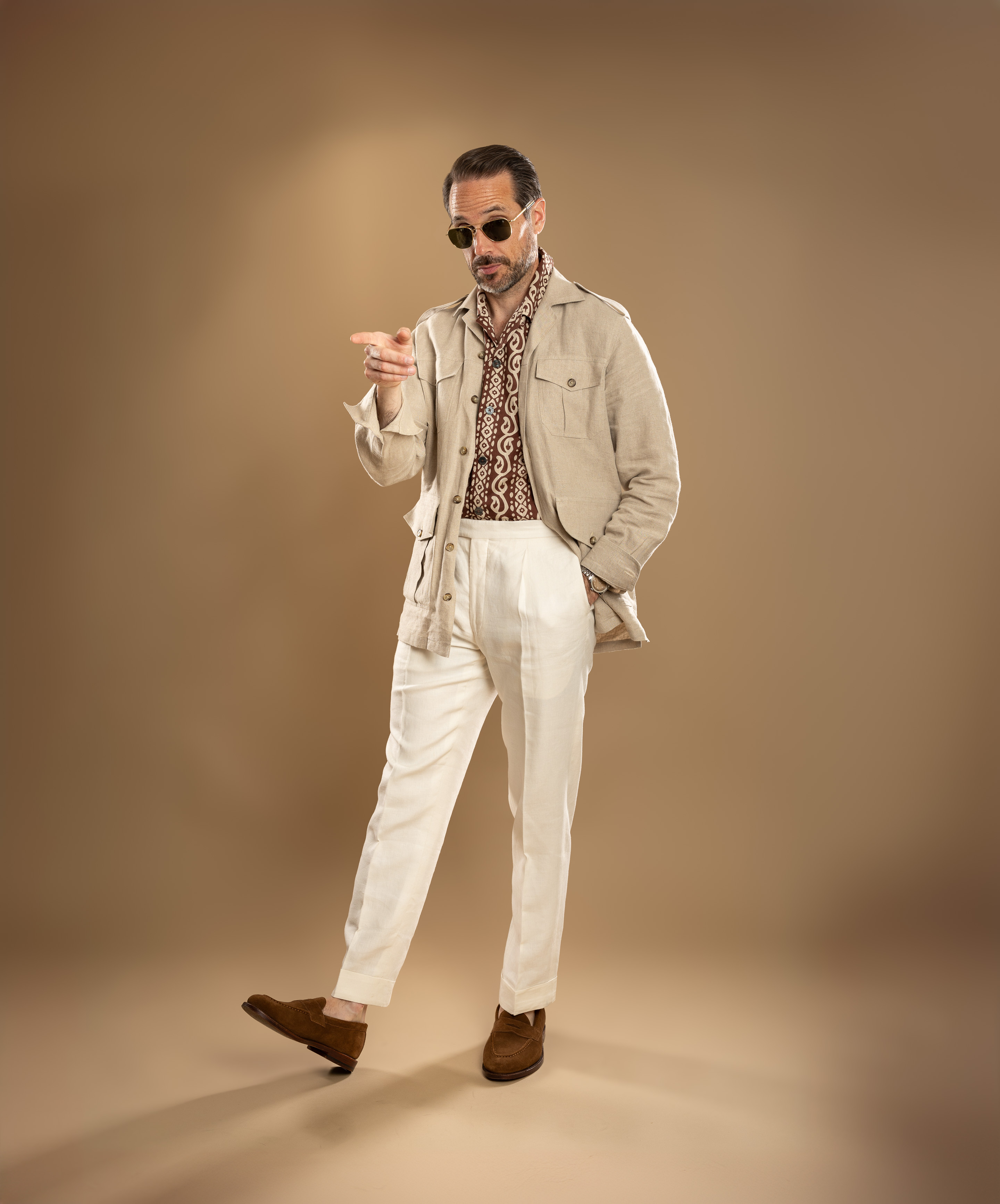 A safari jacket complements this shirt’s color and pattern. #capsulewardrobe

#LTKStyleTip #LTKSeasonal #LTKMens