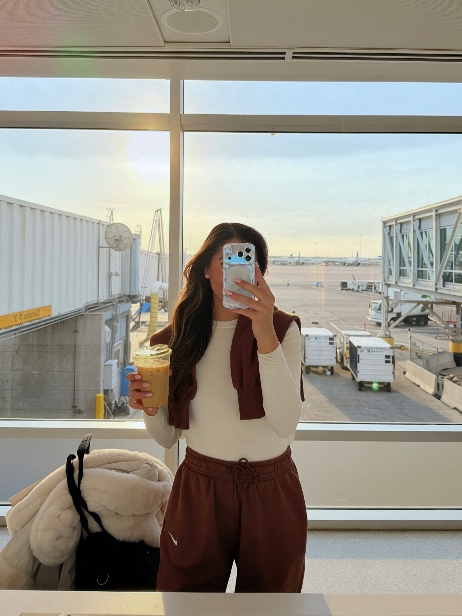 Come fly with me wearing my go to airplane uniform - a cute and cozy matching sweat set 🤎

#LTKdayinmylife #LTKActive #LTKTravel