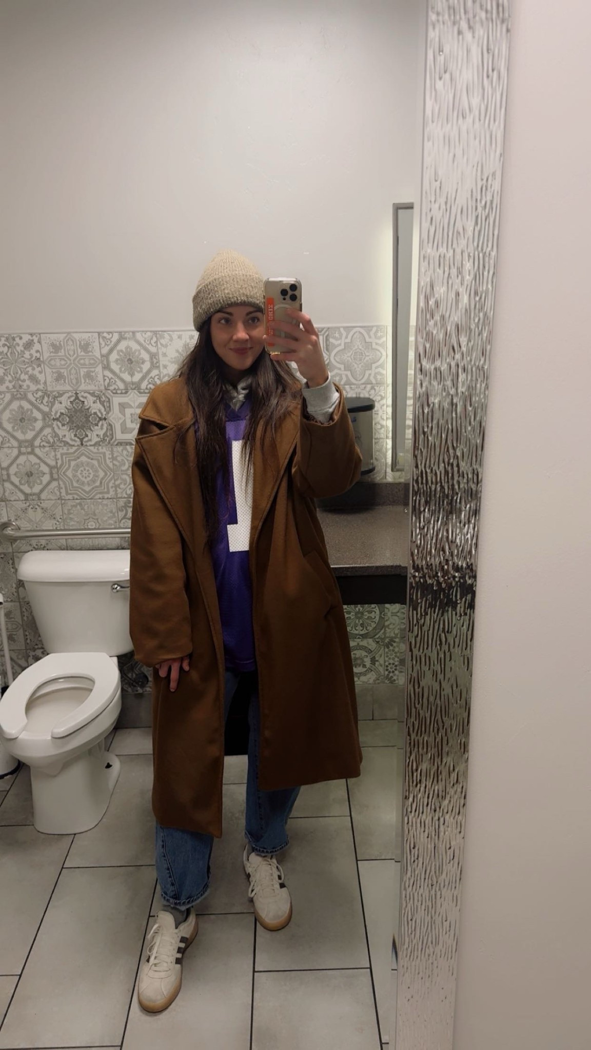 Lambeau Field first timer, Vikings fan for life!!
What a freaking experience! Loved bantering with everyone and staying cozy in my Old Navy winter staples.

All linked below-jersey is a vintage find✨