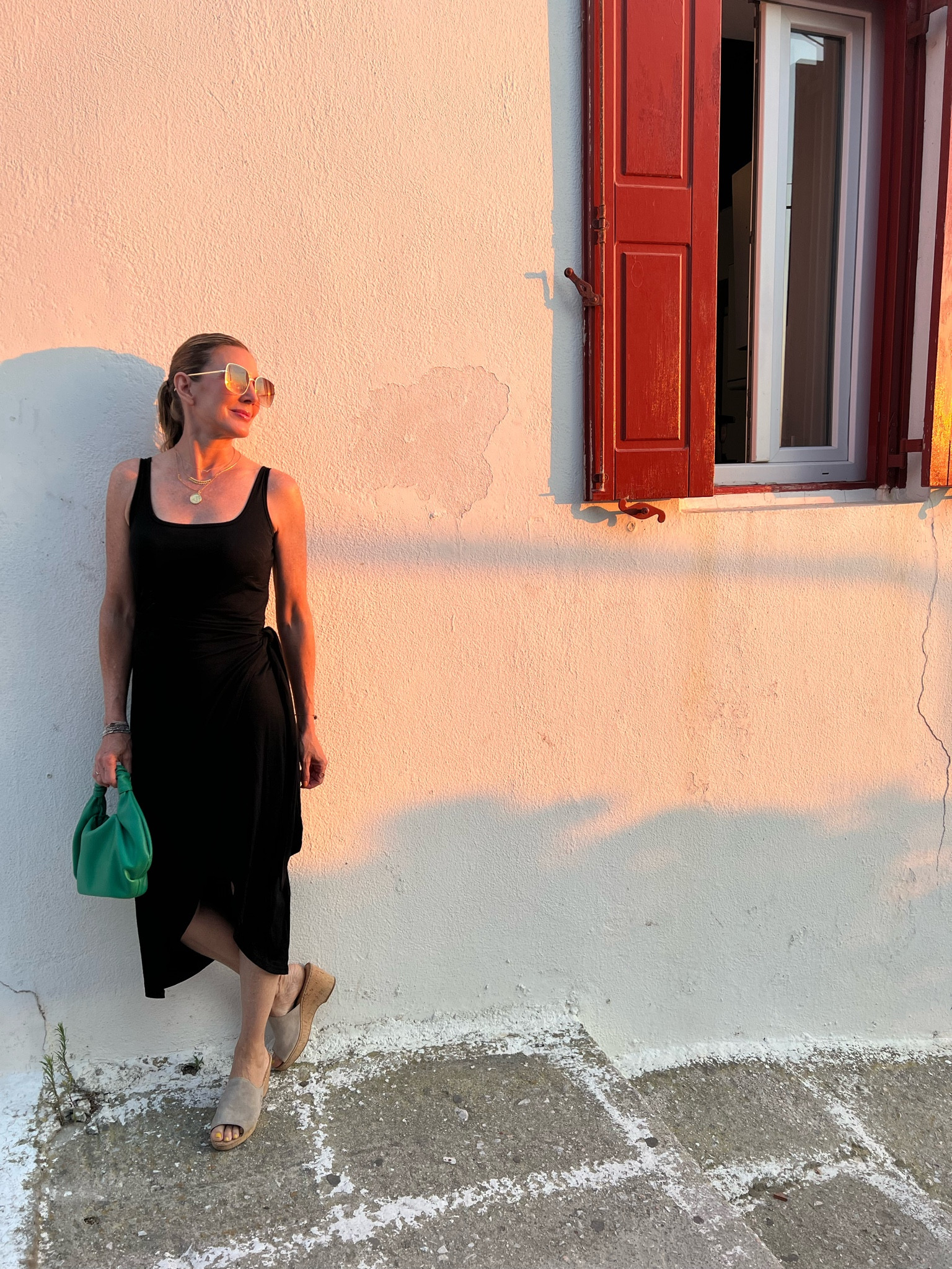 Perfect travel dress, looks great & easy to pack & throw on! Black dress, wedge sandals. 

#LTKtravel #LTKunder50