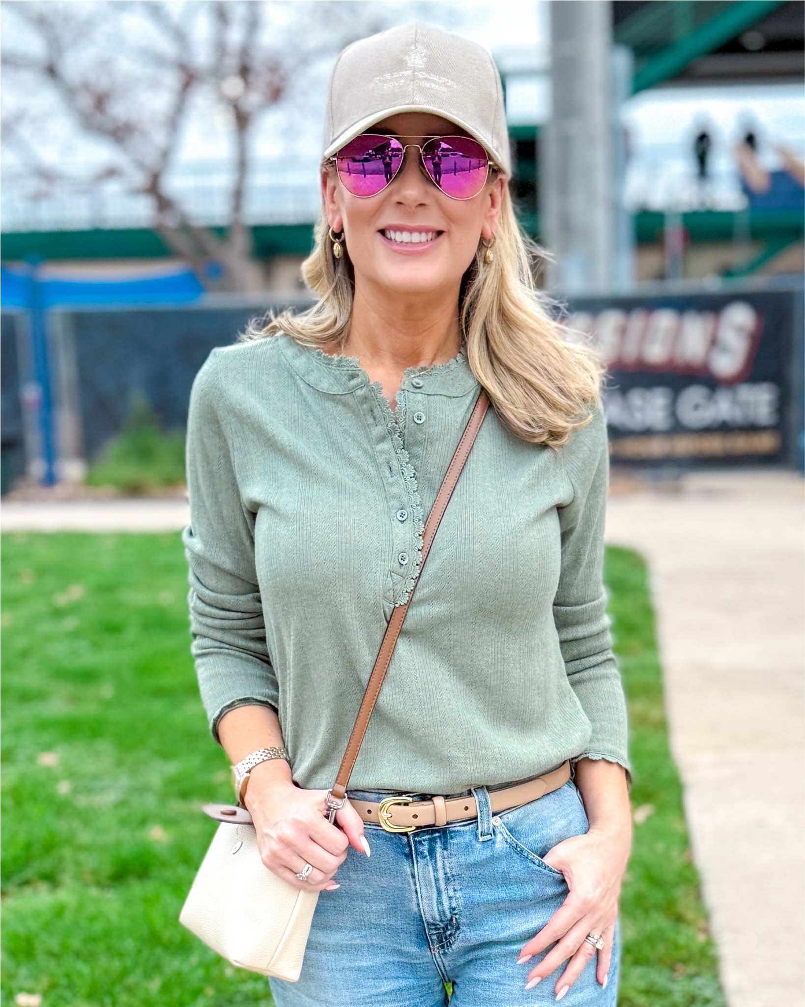 Summer might not be officially over until September 21, but we just marked another unofficial end this weekend. We went to the last home game of the season for  of our AA minor league baseball team. The best part, other than the team winning, is that the temps dropped into the low 70’s, which is absolutely fall weather for San Antonio! 

I’m wearing a new Henley shirt-it’s made of the softest fabric and it has feminine details like subtle lacey trim at the neckline. It’s supposed to be a tight fit so I sized up one from my regular size to get a looser fit. Isn’t it the prettiest color for fall? Use code MARNIE15 to save 15% on it! Everything else are pieces I’ve had in my closet for a little while. Sizing tip on this one specific style of jeans-size down TWO from your waist size. Yep, they run really big but they are so worth it! They’re the lightest weight denim I own so perfect if you live in a warm climate!

#LTKSeasonal #LTKOver40 #LTKShoeCrush