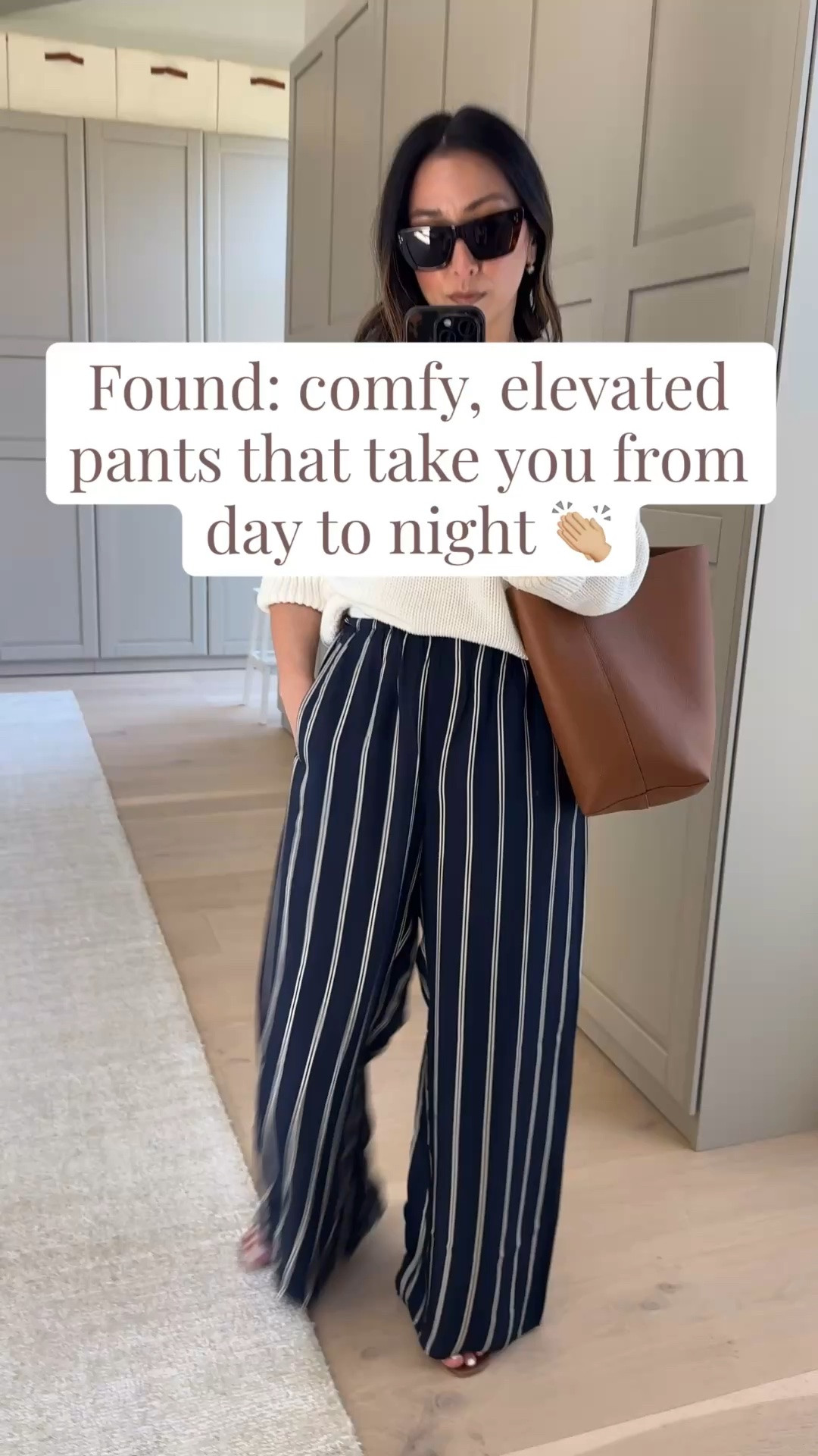 The silky pants that will take you from day to night. Come in petite and regular lengths. 

J.Crew Cosmo pants petite small
Banana Republic cottons sweater xs - new version might be slightly different
Hermes Oran sandals 35
Quince bucket bag
Celine sunglasses
Electric picks earrings
Dorsey James necklace 15"

Spring outfits 2026, petite style

#LTKootd #LTKPetite #LTKSaleAlert