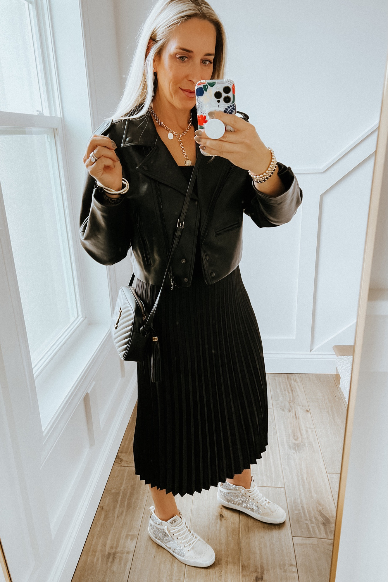 Leather Jacket and J.Crew Midi skirt 

Moto jacket - such a great find for under $100. Love the bomber style as it’s a bit cropped. Wearing a M. 

J.Crew pleated skirt - wearing a small. 

Golden goose mid star sneakers with silver glitter 

Ysl camera bag



#LTKshoecrush #LTKstyletip #LTKover40