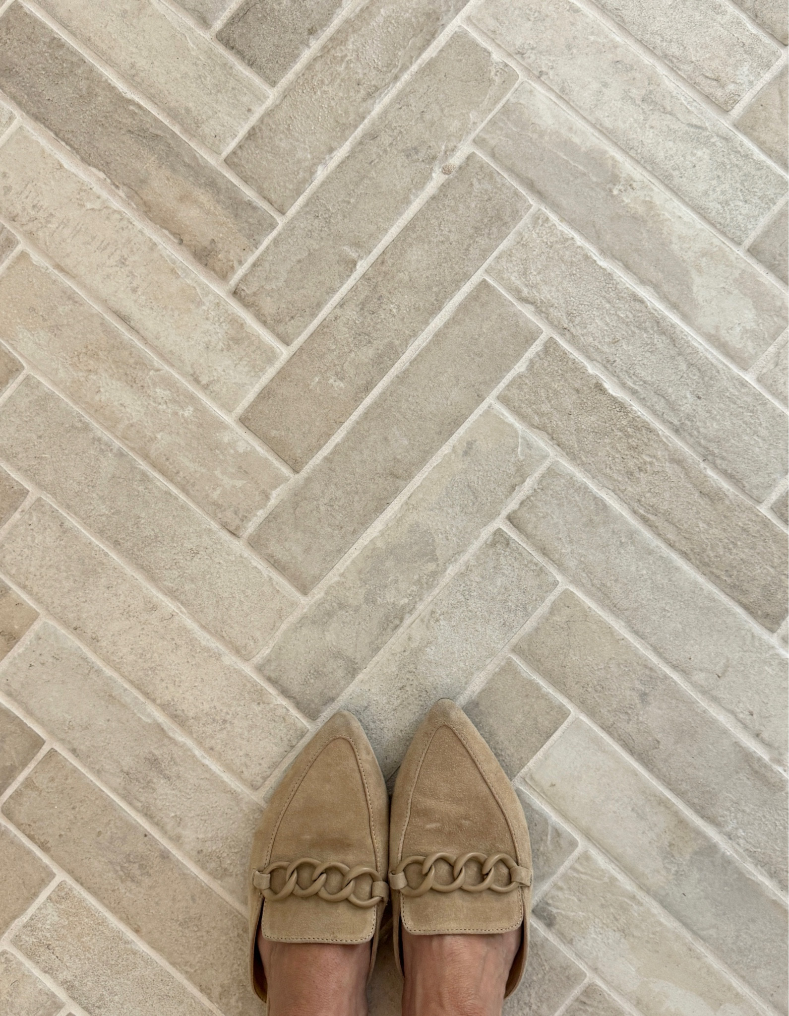 White brick tile floor. Laundry room floor.