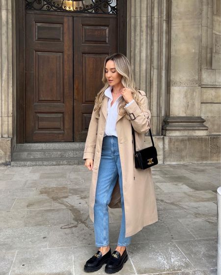 Classic Spring Smart Casual Outfit, featuring a tan beige trench coat styled with a white oversized poplin shirt, blue mom jeans, and Celine accessories, black chunky loafers and Celine Triomphe bag

#LTKworkwear #LTKSeasonal #LTKSpringSale