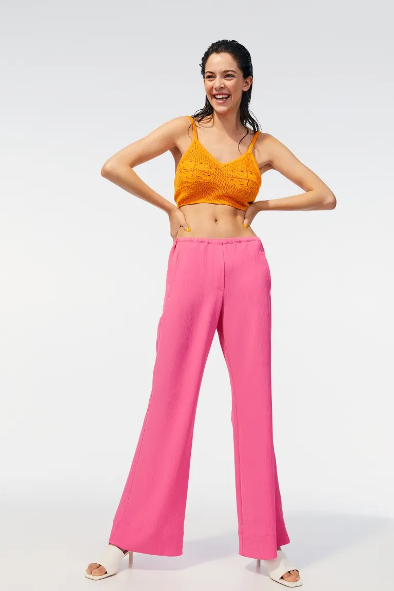 Conscious choice  Pants in woven, crinkled fabric. High waist, narrow drawstring with ties at one... | H&M (US + CA)