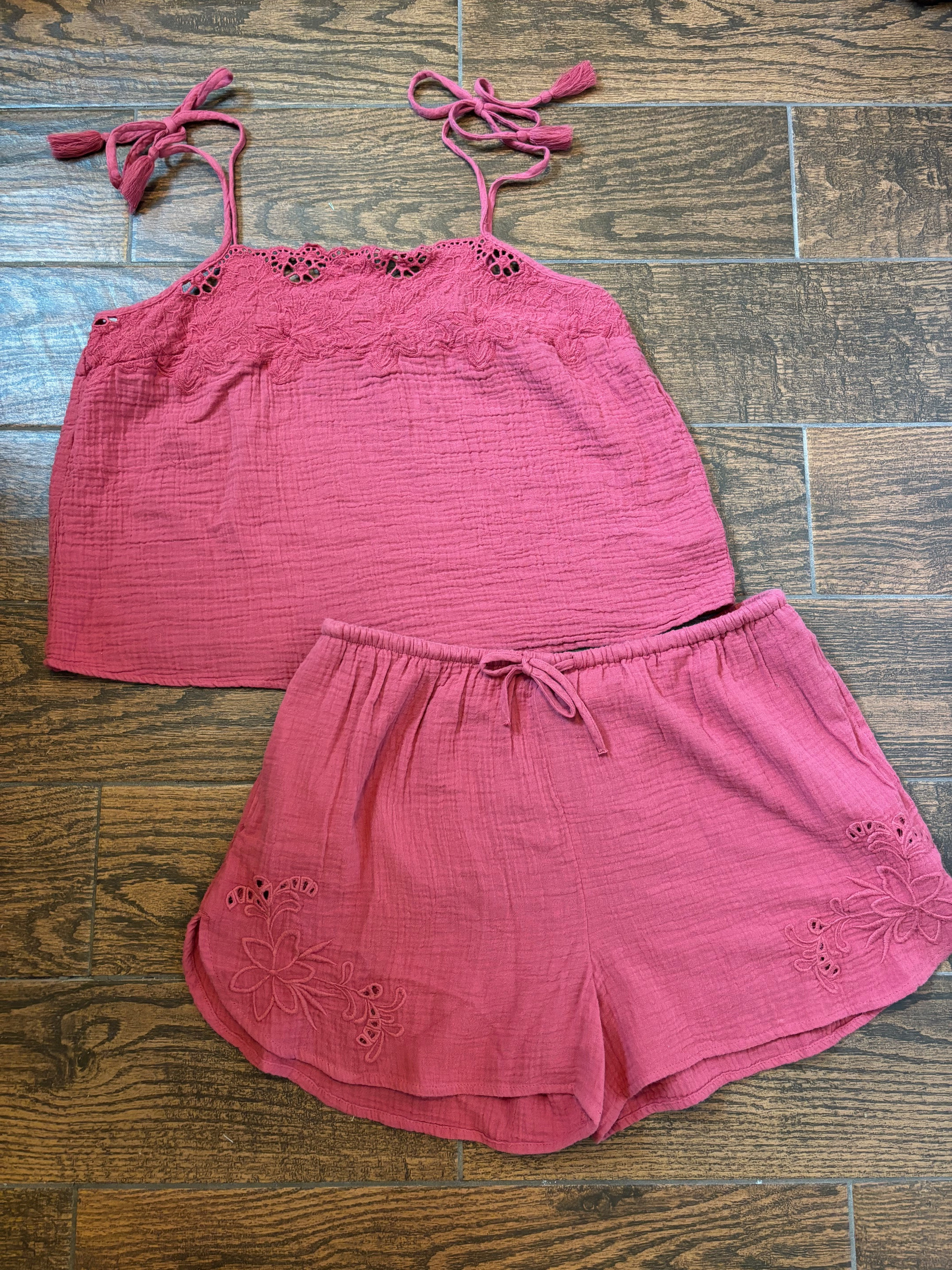 This cute Universal Thread set is on sale at Target right now! The cutwork tank and matching pull-on shorts are such an easy summer outfit. The red is already showing limited sizes, but the olive green is fully stocked, so grab your favorite while you can! 

 #LTKootd #LTKSaleAlert #LTKMidsize