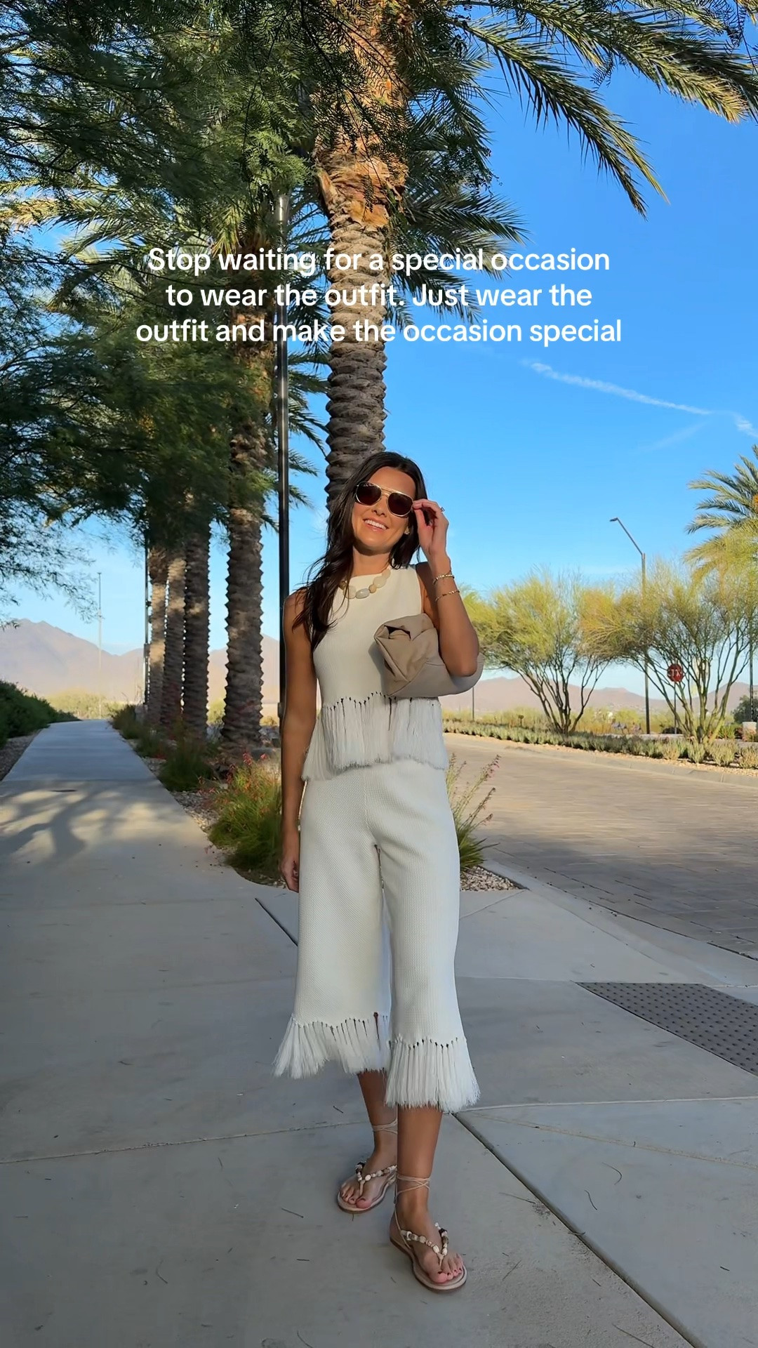 My fringe set is back in stock! I am 5’7” wearing a size XS in top and bottom, and have the waist of the pants rolled one time, so you could size down if you are in between sizes! The fabric is a nice thicker knit but still feels wearable in the summer :)
