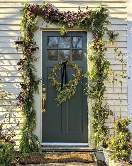 Holiday front door…plus new paint colors and sconce! 🌿✨

Farrow & Ball, Emtek Products brass door hardware, velvet ribbon, homemade wreath, Aflorql faux garland, Hinkley outdoor sconce, Lamps Plus, holiday decor, Christmas decor, outdoor decoration, front door, green paint, Terrain, McGee & Co, planter, terracotta urn, Nearly Natural, boxwood spiral 

#LTKhome #LTKSeasonal #LTKHoliday