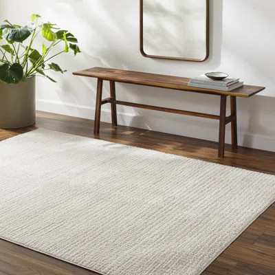 Arny Solid Color Machine Woven Polyester Area Rug in Cream | Wayfair North America