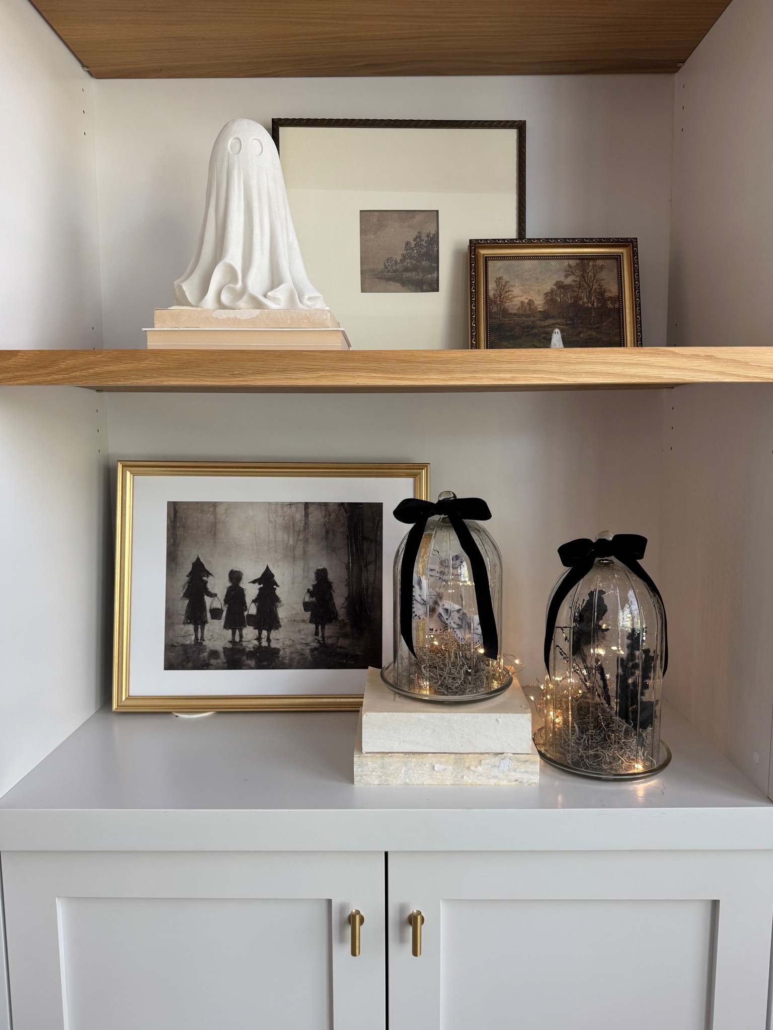 Spooky bookshelf styling 

#LTKSeasonal #LTKHome #LTKFindsUnder100