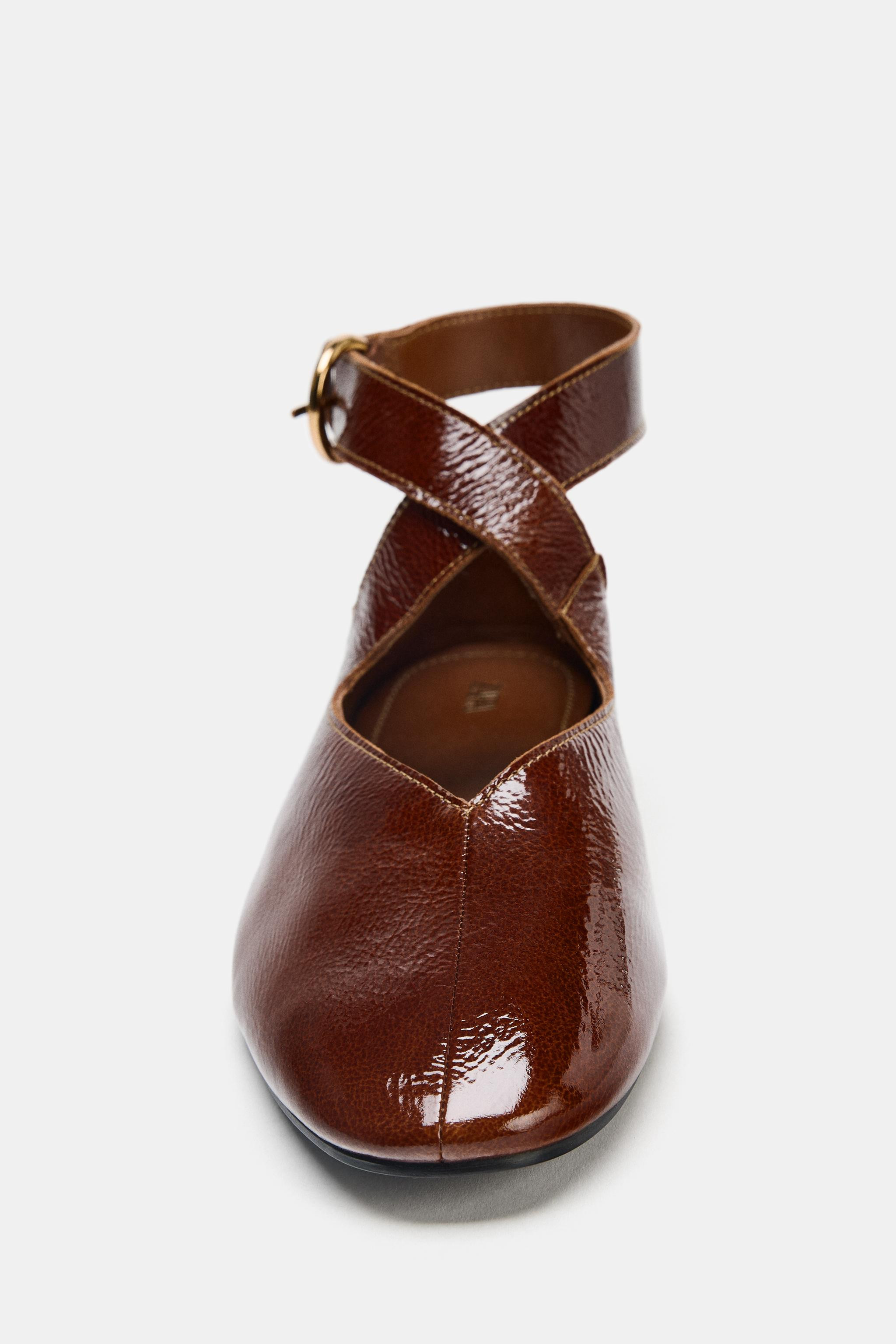 PATENT-EFFECT BALLET FLATS WITH BUCKLE49.99 GBPBrown | 3591/510/700Put it in your basketSelect a ... | Zara UK