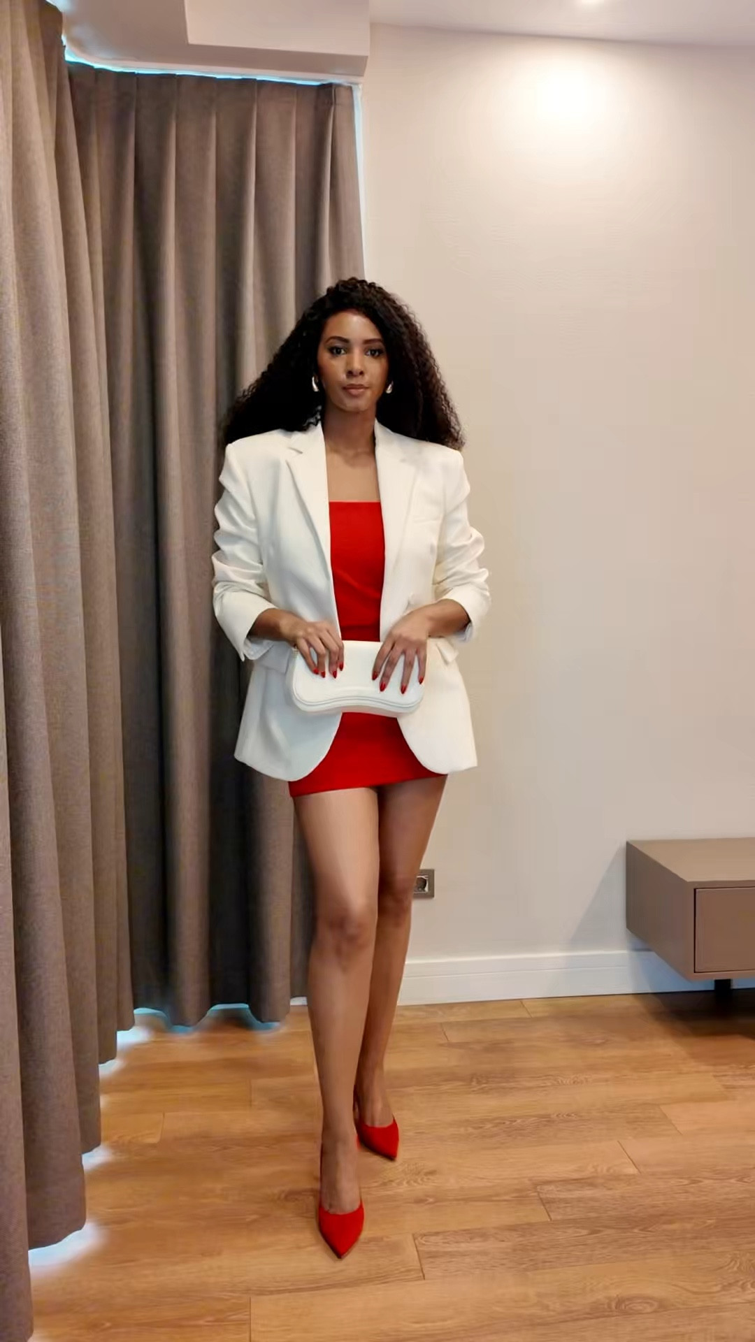 A white blazer layered over a red mini dress for a fresh take on classic power dressing. The structured contrast keeps it elegant yet playful. 

#LTKsummer #LTKspring #LTKstyletip