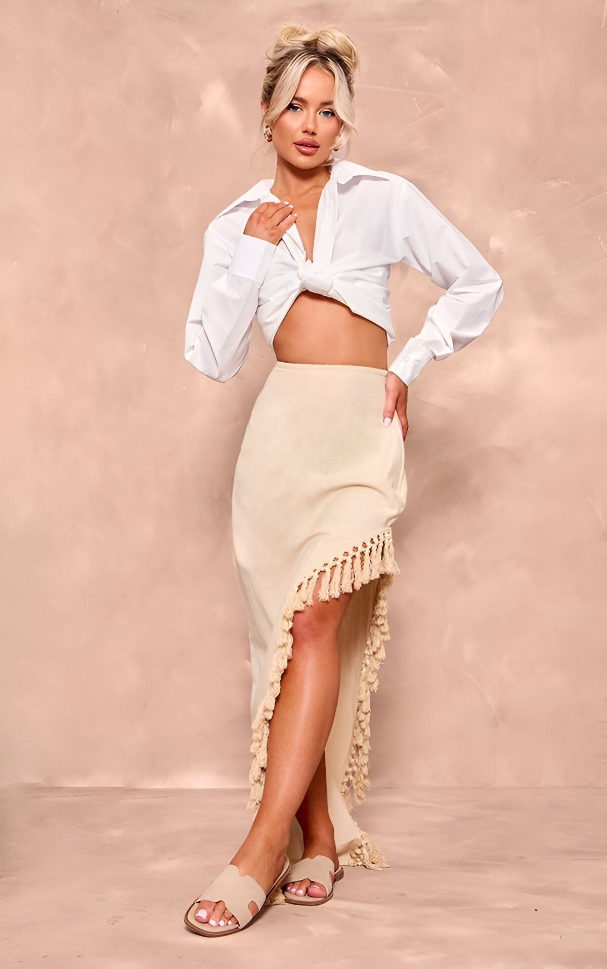 Your new favorite maxi skirt just dropped! This beige linen-look beauty with its tassel hem and thigh split is perfect for elevated summer style. Tap to shop this must-have! #MaxiSkirt #LinenLook #SummerStyle #EffortlessFashion #MustHave #ShopNow

#LTKActive #LTKU #LTKStyleTip