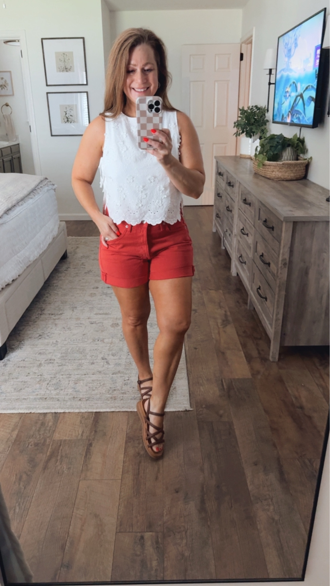 Summer outfit idea 
Eyelet top with side tie detail 
Denim shorts with cuffs and button fly
Sandals

#LTKootd #LTKPetite #LTKOver40