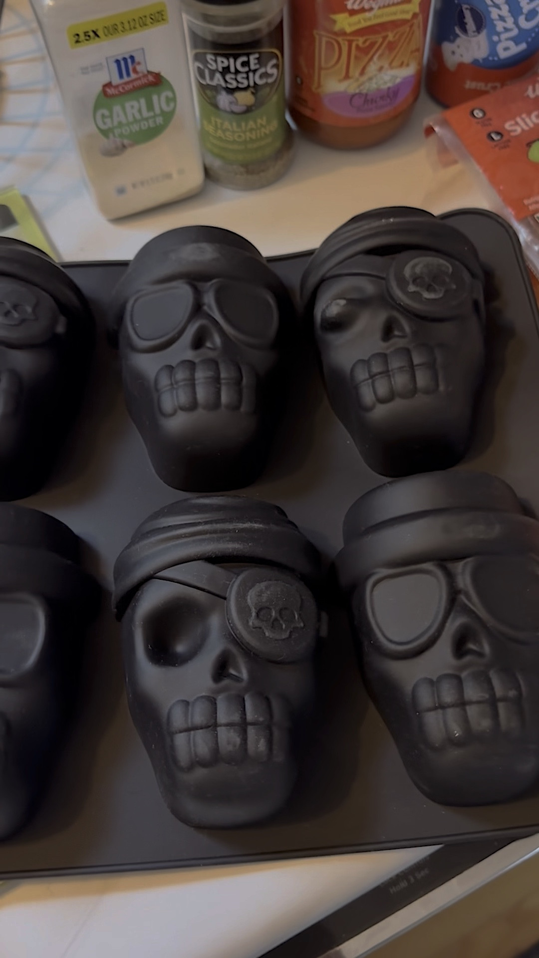 these pizza skulls are about to become your new favorite Halloween recipe 💀 these are so easy to make and completely customizable! save this post to make for your upcoming party!

skull mold is linked in my @shop.ltk 🖤

ingredients:
one pre-made pillsbury pizza dough
pizza sauce 
shredded mozzarella cheese
your favorite pizza toppings (I used pepperoni)

directions:
pre-heat oven to 400 degrees. unroll the sheet of dough and cut in to 6 equal size strips. place a strip of dough in each mold. fill with your cheese, sauce and other toppings and then fold the edges of the dough to seal shut. bake for 20-25 minutes. let cool a few minutes before removing them from the mold. enjoy!

.
.
.

#pizzaskulls #halloweenrecipe #halloweentreat #halloweenparty #happyhalloween #spookyseason #seasonofthewitch #bootoyou #fallvibes #octoberthings #trickortreat #ltk #teamltk 

#LTKHalloween #LTKHome #LTKFamily