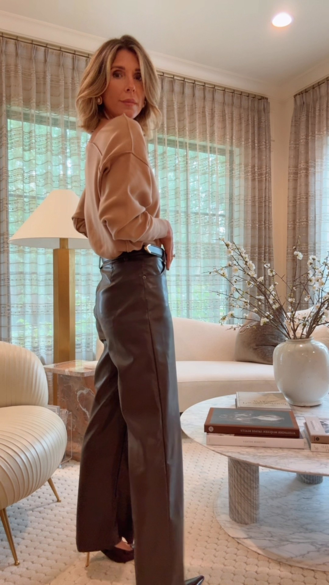 The wide leg faux leather pants in chocolate and so good and on sale under $80! I'm wearing size xs in my pants and small in my sweater. @bloomingdales #ad #bloomingdales