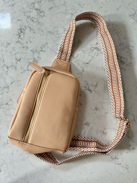Cutest Amazon faux leather belt bag with adorable strap! You can adjust to one strap or backpack style. Perfect size for travel to fit phone, chapstick and wallet! 

#LTKtravel #LTKstyletip #LTKGiftGuide