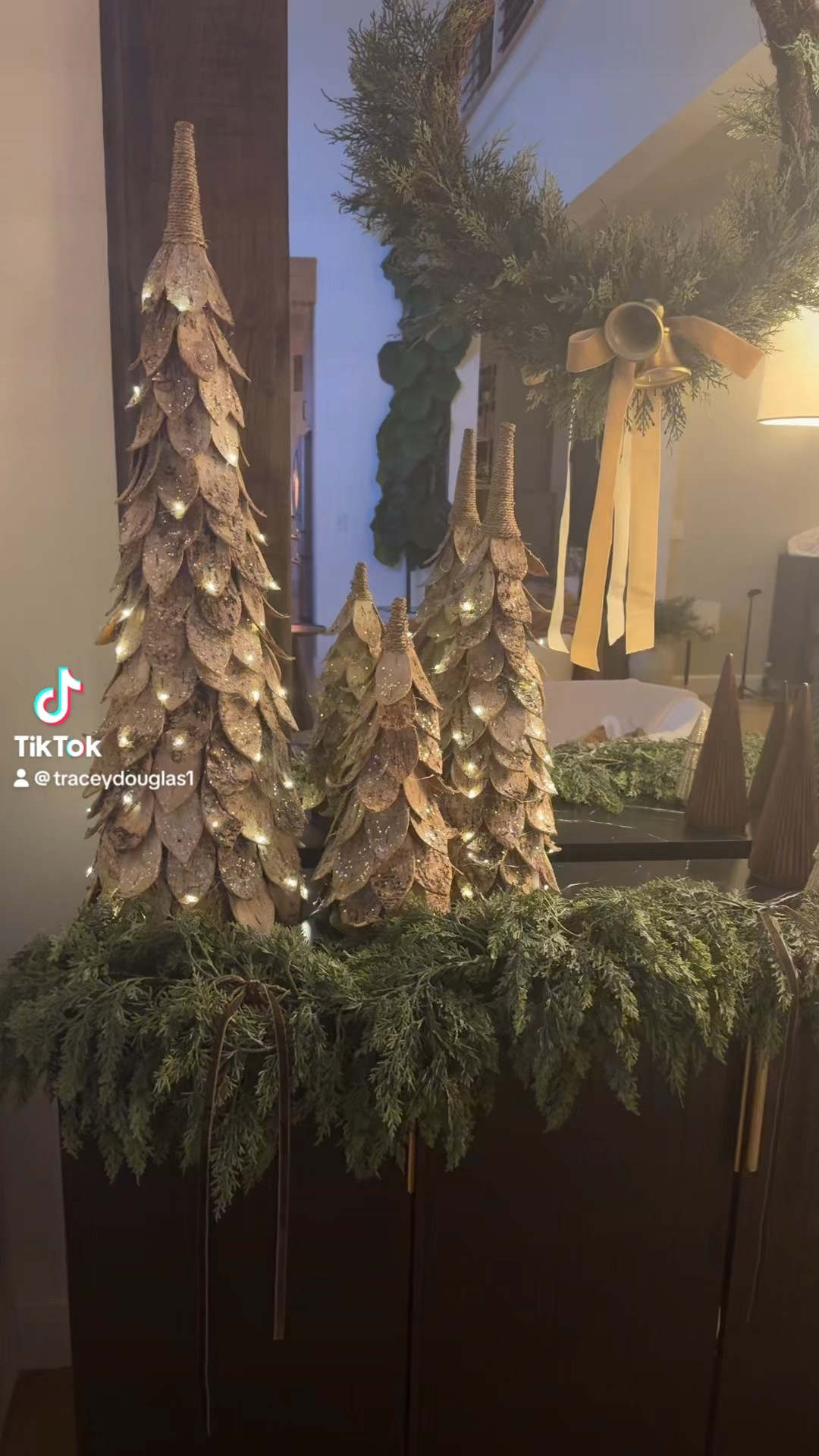 I love how realistic these trees look!  Added chocolate ribbon to tie all the colors together! #modernchristmasdecor #farmhousemodernchristmasdecor #christmasdecor #potterybarnchristmas

#LTKHoliday #LTKSeasonal #LTKHome