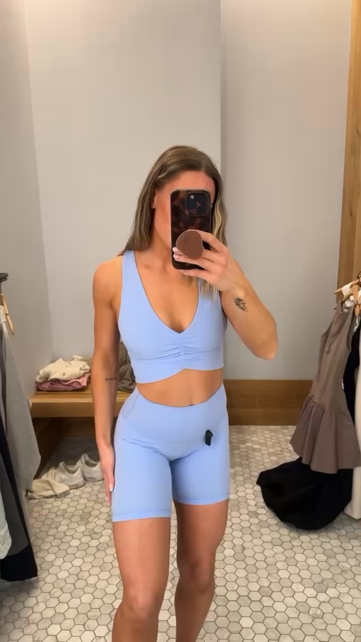 V neck sports bra with the prettiest back! 🤩 Wearing a size small in the dayflower blue limited edition color. 

Shorts are high rise with a 7 inch seam designed to hit around mid thigh. Wearing a size 2.

 

#LTKFindsUnder100 #LTKWatchNow #LTKActive