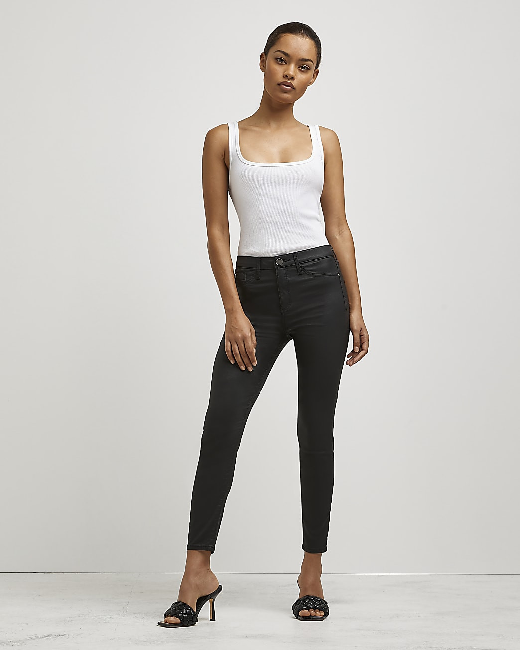 Petite black coated Molly skinny jeans | River Island (UK & IE)
