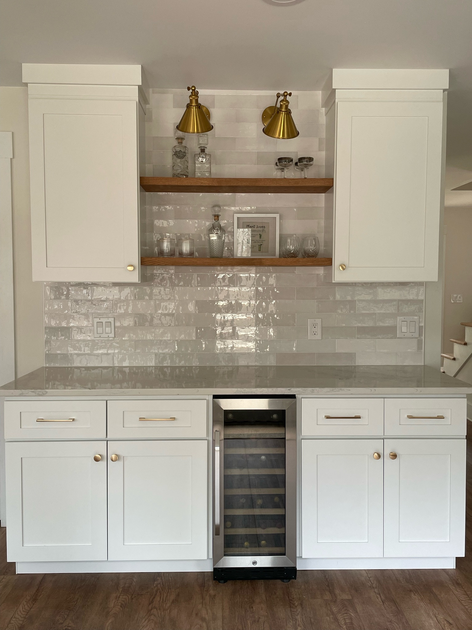 Bar area with built in wine fridge and floating shelves. I linked everything I could 