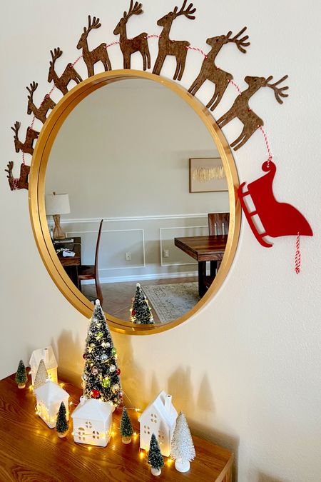 Holiday decorating mostly from Target. Reindeer garland, bottle brush trees, ceramic houses, fairy lights 

#LTKSeasonal #LTKHolidaySale #LTKHoliday