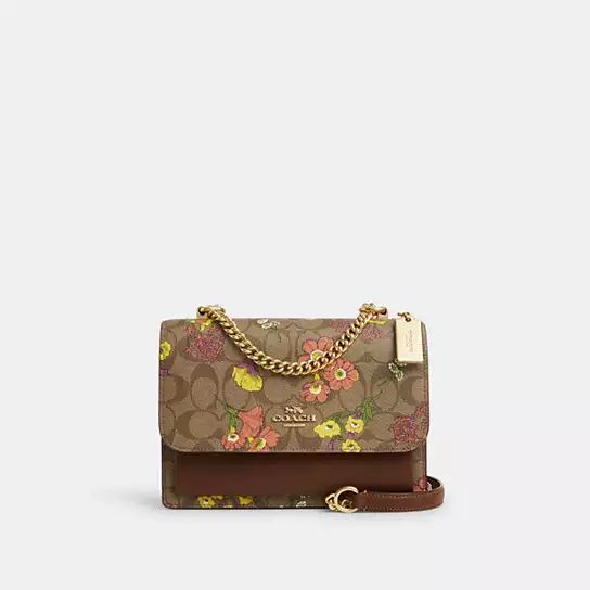 Klare Crossbody Bag In Signature Canvas With Floral Print | Coach Outlet
