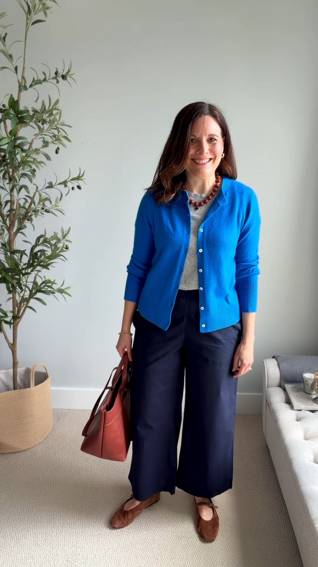 Here’s a close-up of the new lightweight cotton poplin pants I just shared in my August work outfits post. I tried these pants in black and navy. These are a size medium, and my true size. I’ll return the black in a size large because it’s just too big all over. This Old Navy cardigan fits small. I sized up all the way up to a large. I love the contrast of the light gray tee provides here. ￼

#LTKOver40 #LTKSaleAlert #LTKMidsize