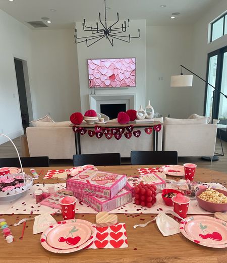 (2 of 2) Galantines valentines party! Threw this for my girls and some friends we froze pink lemonade into chocolate mold for heart Ice cubes! Heart sweatsuits so cozy and soft! Heart claw clips 

#LTKparties #LTKkids #LTKfamily