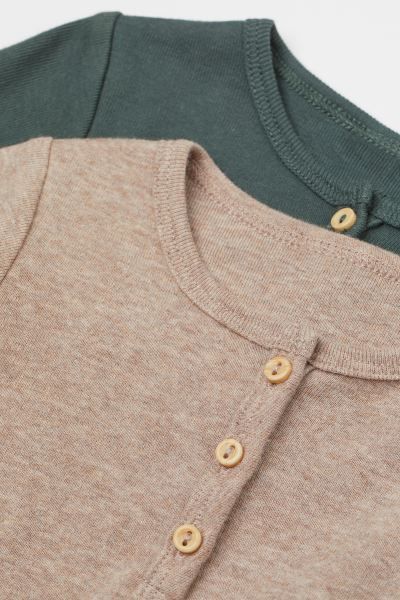 Baby Exclusive. Long-sleeved henley shirts in soft organic cotton jersey with a button placket. | H&M (US + CA)